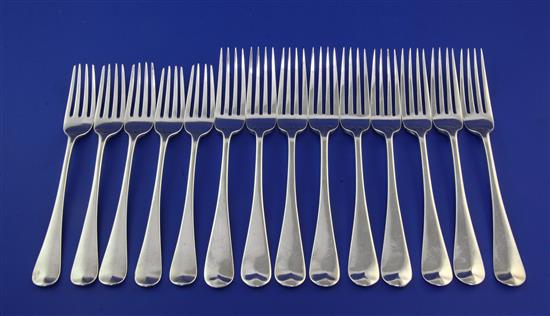 A set of nine Victorian silver Hanovarian pattern dessert forks and a similar set of five dessert forks, 19 oz.